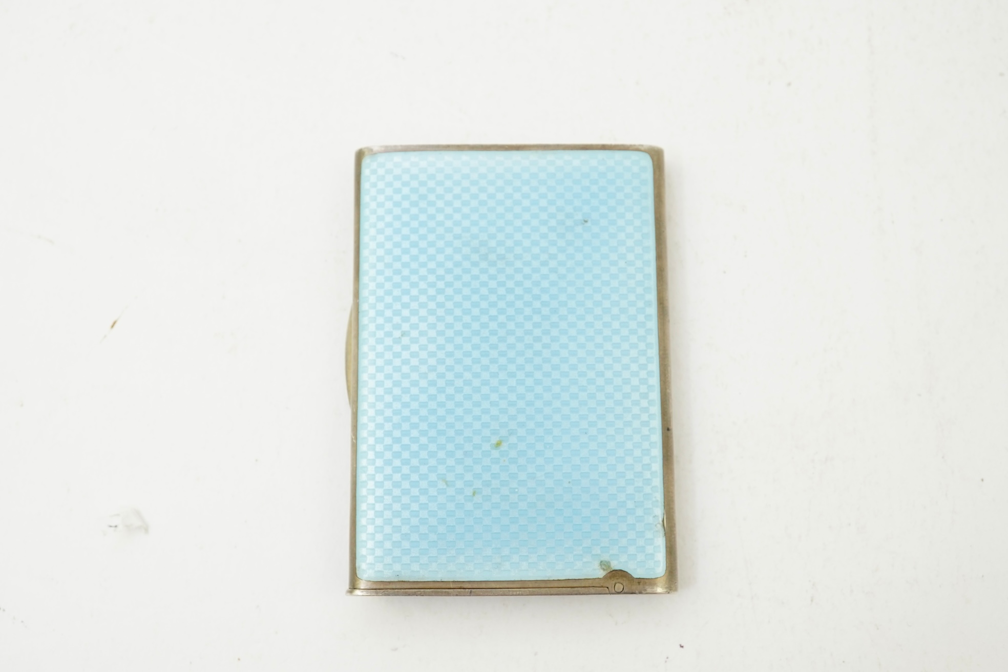 An early 20th century Viennese sterling and blue enamel combination cigarette/vesta case, inscribed Carl Heiss Wien Graben 11